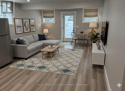 Virtually Staged Living Area - 2 - 242 South Rankin Street, Saugeen Shores, ON - Indoor Photo Showing Living Room