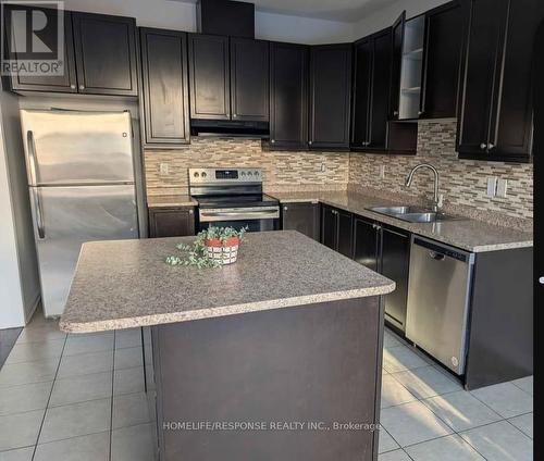 1059 Savoline Boulevard, Milton, ON - Indoor Photo Showing Kitchen With Stainless Steel Kitchen With Double Sink With Upgraded Kitchen