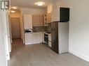 107 - 396 Highway 7 Road E, Richmond Hill, ON  - Indoor Photo Showing Kitchen 