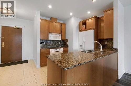 5055 Riverside Drive Unit# 201, Windsor, ON - Indoor Photo Showing Kitchen With Double Sink