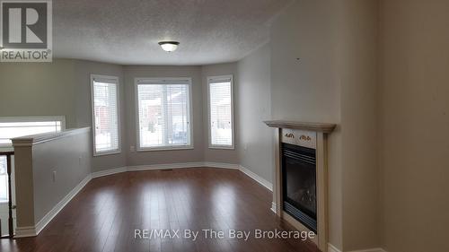 42 Tona Trail, Wasaga Beach, ON - Indoor Photo Showing Other Room With Fireplace