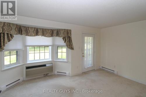 TO OUT SIDE PATIO - 4 - 693 Whitaker Street, Peterborough (Ashburnham Ward 4), ON - Indoor Photo Showing Other Room