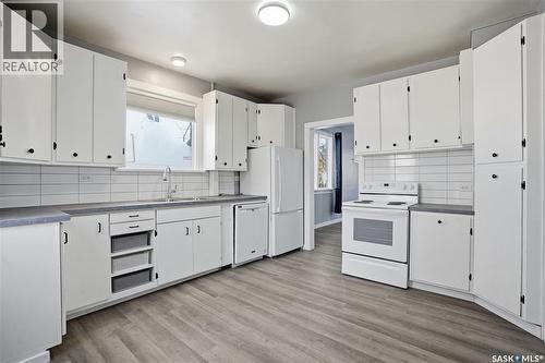 1300 Athol Street, Regina, SK - Indoor Photo Showing Kitchen With Double Sink