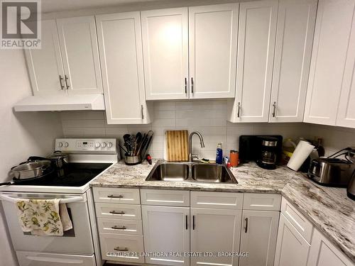 317 - 573 Armstrong Road, Kingston (East Gardiners Rd), ON - Indoor Photo Showing Kitchen With Double Sink