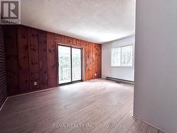 Primary Bedroom walk out to covered deck - 