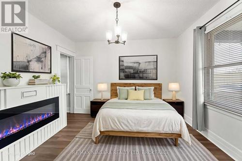 Main floor 3rd bedroom/home office/family room - 22 Bertram Street, St. Catharines (E. Chester), ON - Indoor Photo Showing Bedroom