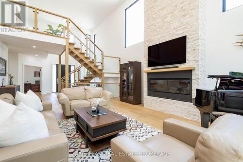 183 Woodland Drive, Wasaga Beach, ON - Indoor Photo Showing Living Room With Fireplace