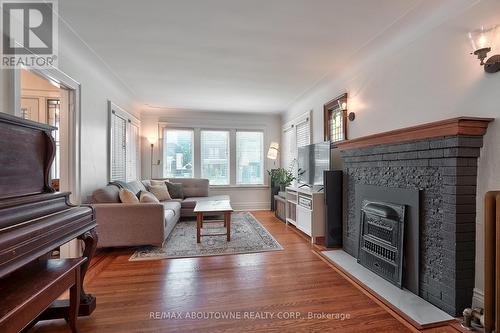 23 Ottawa Street S, Hamilton, ON - Indoor Photo Showing Living Room With Fireplace