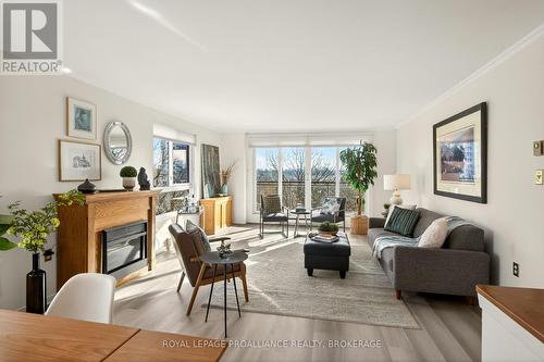 503 - 115 Barrett Court, Kingston (Kingston East (Incl Barret Crt)), ON - Indoor Photo Showing Living Room With Fireplace