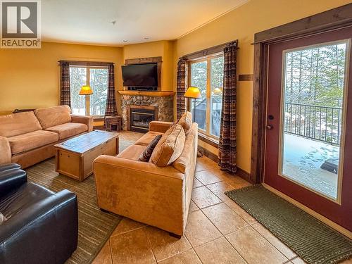 1351 Gerry Sorensen Way Unit# G4-B, Kimberley, BC - Indoor Photo Showing Living Room With Fireplace