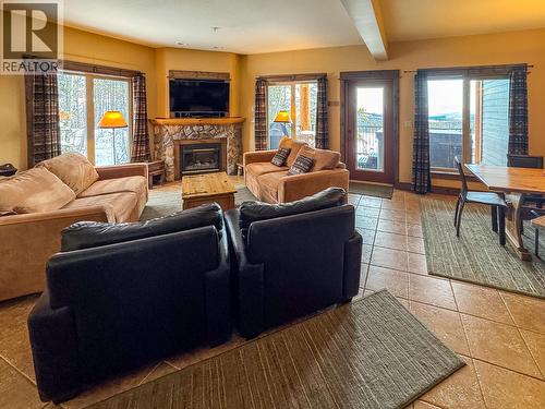 1351 Gerry Sorensen Way Unit# G4-B, Kimberley, BC - Indoor Photo Showing Living Room With Fireplace