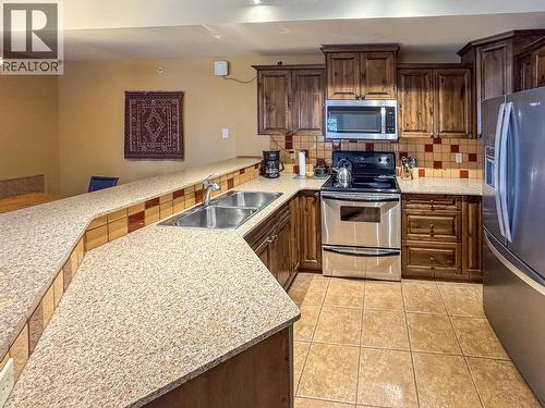 1351 Gerry Sorensen Way Unit# G4-A, Kimberley, BC - Indoor Photo Showing Kitchen With Double Sink