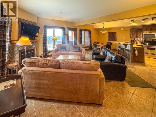 1351 Gerry Sorensen Way Unit# G4-A, Kimberley, BC - Indoor Photo Showing Living Room With Fireplace