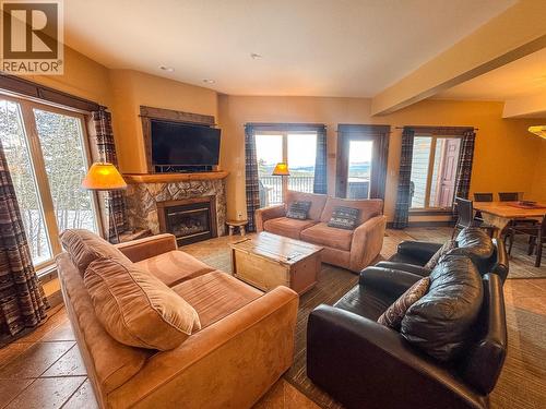 1351 Gerry Sorensen Way Unit# G4-A, Kimberley, BC - Indoor Photo Showing Living Room With Fireplace