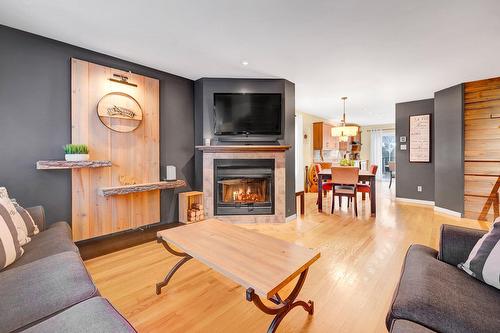 Vue d'ensemble - 1062 Rue Principale, Prévost, QC - Indoor Photo Showing Living Room With Fireplace