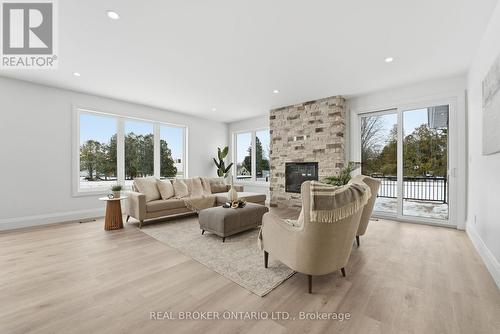 130 La Salette Road, Norfolk, ON - Indoor Photo Showing Living Room With Fireplace