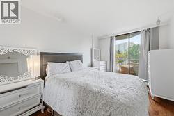 Primary Bedroom with private Balcony - 