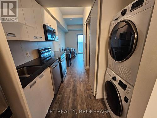 809 - 652 Princess Street, Kingston (Central City East), ON - Indoor Photo Showing Laundry Room