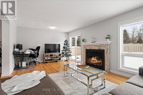 2060 Gardenway Drive, Ottawa, ON - Indoor Photo Showing Living Room With Fireplace