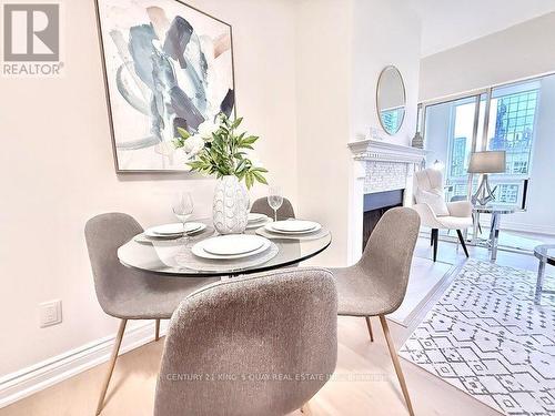 Lph2 - 25 Grenville Street, Toronto, ON - Indoor Photo Showing Dining Room With Fireplace