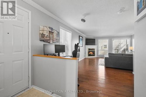 57 Waterbridge Drive, Ottawa, ON - Indoor With Fireplace