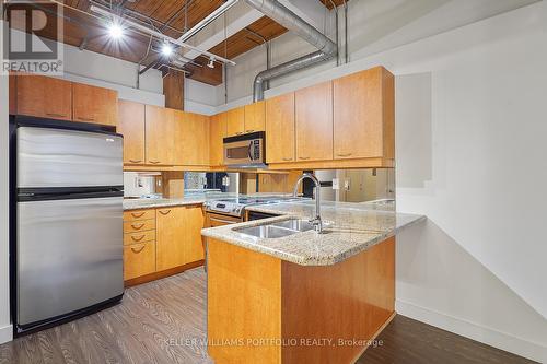 324 - 955 Queen Street W, Toronto, ON - Indoor Photo Showing Kitchen With Double Sink