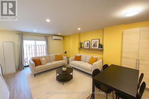 Virtually Staged - 160 Westcourt Place, Waterloo, ON - Indoor Photo Showing Living Room