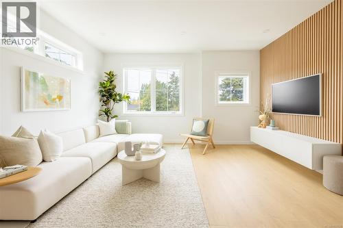 *Different floorplan, similar finishings - Th9 3450 Whittier Ave, Saanich, BC - Indoor Photo Showing Living Room