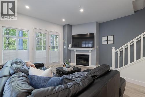 2880 E Kent Avenue South, Vancouver, BC - Indoor Photo Showing Living Room With Fireplace
