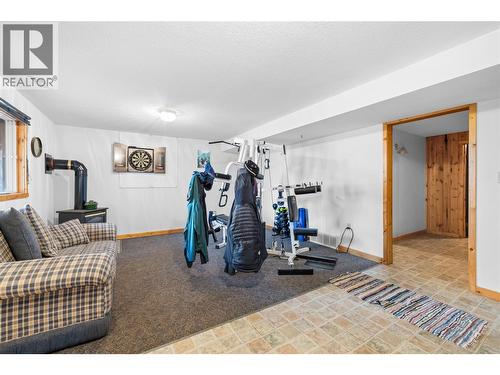 2033 Smith Road, Creston, BC - Indoor Photo Showing Gym Room