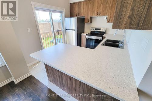 9 Mann Trail, Welland, ON - Indoor Photo Showing Kitchen With Double Sink