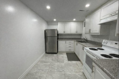 Room-38 Meandering Trail, Toronto, ON - Indoor Photo Showing Kitchen With Double Sink