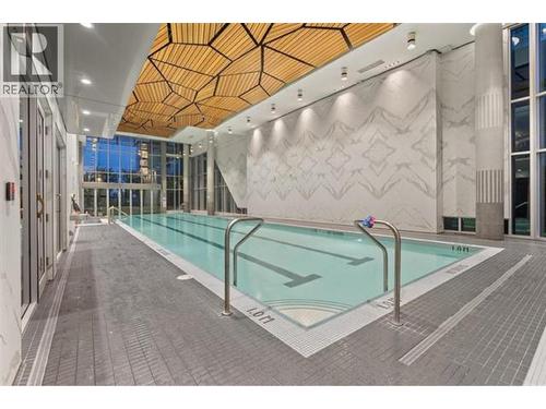 1909 1550 Fern Street, North Vancouver, BC - Indoor Photo Showing Other Room With In Ground Pool