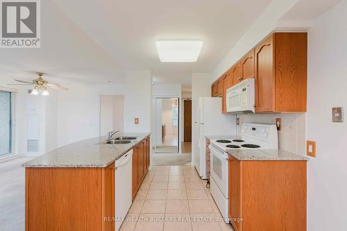 305 - 1720 Eglinton Avenue E, Toronto, ON - Indoor Photo Showing Kitchen With Double Sink