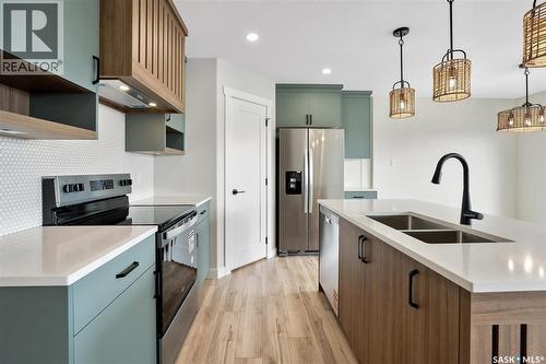 222 Yuel Lane, Saskatoon, SK - Indoor Photo Showing Kitchen With Double Sink With Upgraded Kitchen