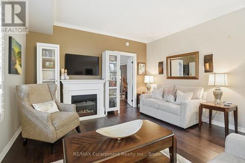 310 - 5188 Lakeshore Road, Burlington (Appleby), ON - Indoor Photo Showing Living Room With Fireplace