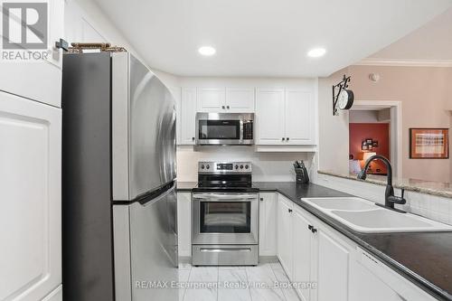 310 - 5188 Lakeshore Road, Burlington (Appleby), ON - Indoor Photo Showing Kitchen With Stainless Steel Kitchen With Double Sink