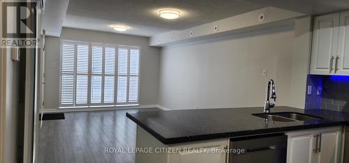 2048 - 75 George Appleton Way, Toronto, ON - Indoor Photo Showing Kitchen With Double Sink