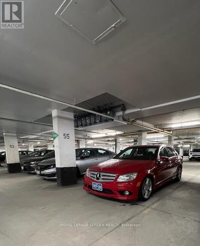 2048 - 75 George Appleton Way, Toronto, ON - Indoor Photo Showing Garage