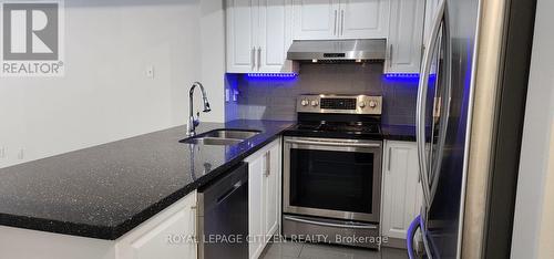 2048 - 75 George Appleton Way, Toronto, ON - Indoor Photo Showing Kitchen With Stainless Steel Kitchen With Double Sink