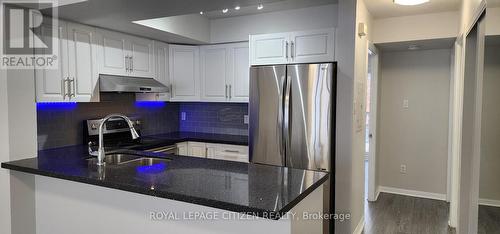 2048 - 75 George Appleton Way, Toronto, ON - Indoor Photo Showing Kitchen With Stainless Steel Kitchen With Double Sink With Upgraded Kitchen