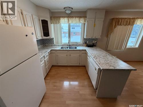 120 6Th Street E, Ponteix, SK - Indoor Photo Showing Kitchen With Double Sink
