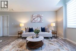 Living area featuring wood finished floors - 