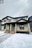 3320 Favel Drive, Regina, SK  - Outdoor With Facade 