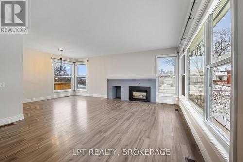 9 Elizabeth Avenue, Kingston (West Of Sir John A. Blvd), ON - Indoor Photo Showing Living Room With Fireplace
