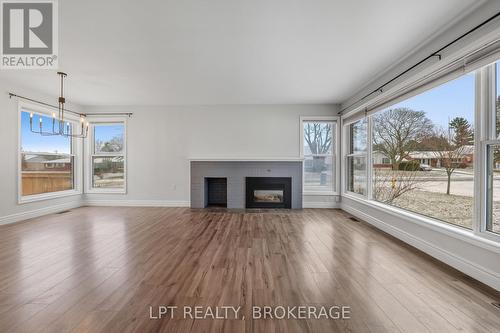 9 Elizabeth Avenue, Kingston (West Of Sir John A. Blvd), ON - Indoor Photo Showing Living Room With Fireplace