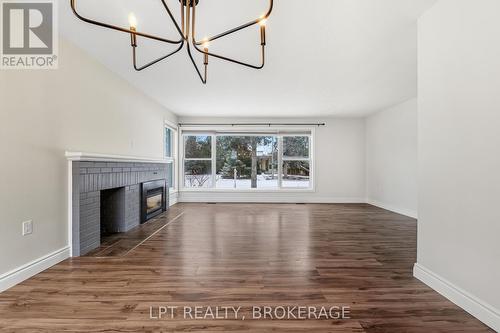 9 Elizabeth Avenue, Kingston (West Of Sir John A. Blvd), ON - Indoor With Fireplace