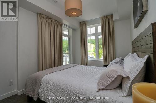 203 - 40 Horseshoe Boulevard, Oro-Medonte, ON - Indoor Photo Showing Bedroom