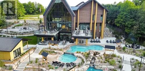 203 - 40 Horseshoe Boulevard, Oro-Medonte, ON - Outdoor With In Ground Pool