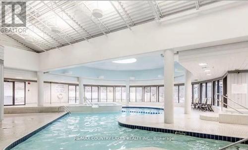 203 - 40 Horseshoe Boulevard, Oro-Medonte, ON - Indoor Photo Showing Other Room With In Ground Pool